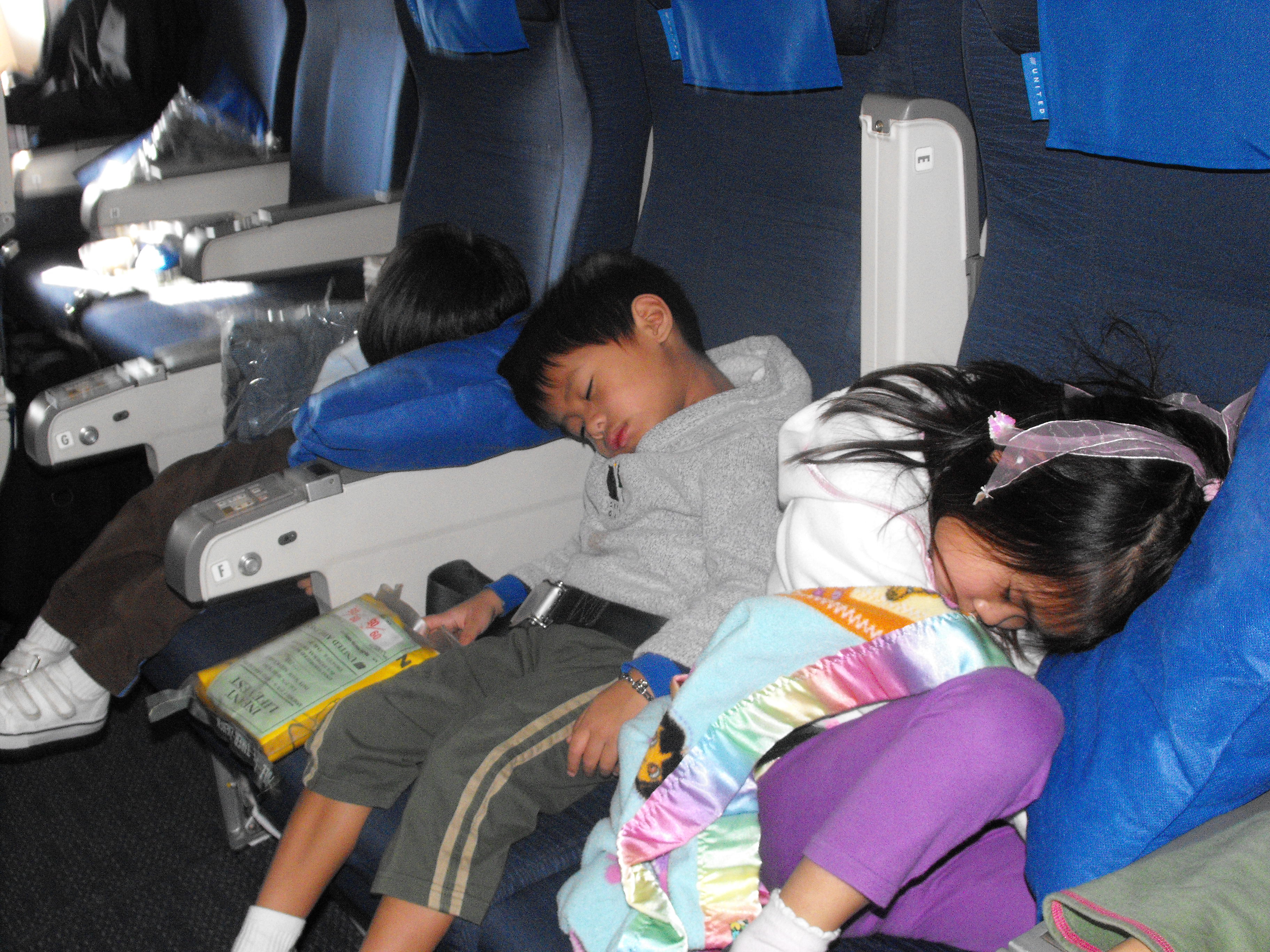 My brothers and I on the plane to Thailand in 2009